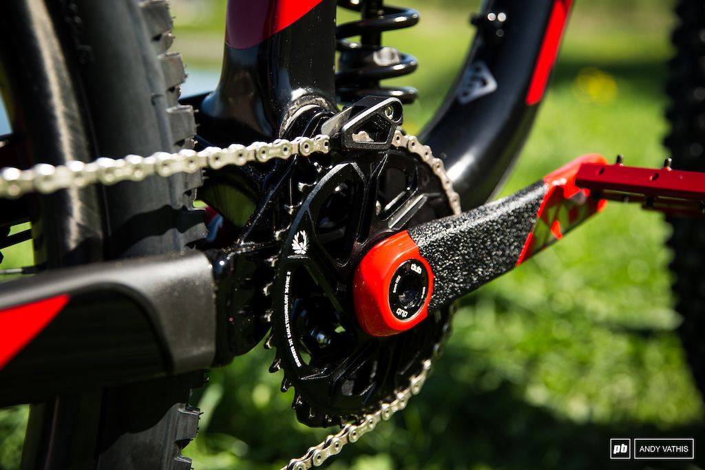 Small but very effective OneUp chain guide and a color match crank set to boot.