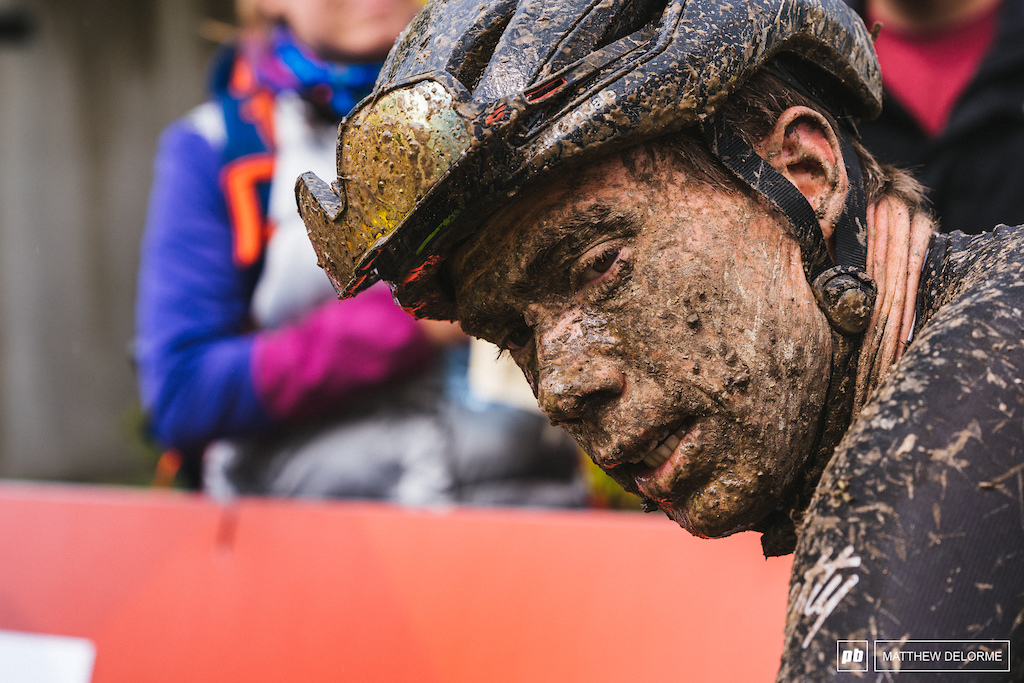 Maxime Marotte wearing all of the mud after the race.