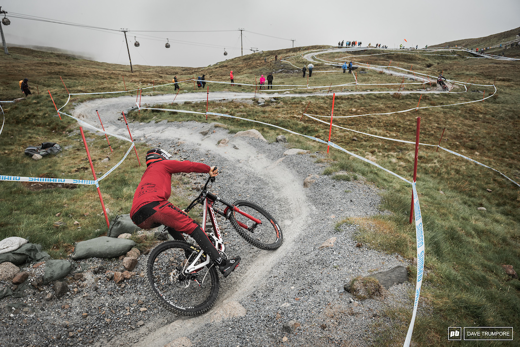 Sam Belnkinsop snakes down a damp Fort William track on his final practice run.