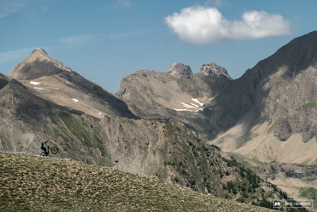 Josh Carlson, a ridge line, and some big mountains.