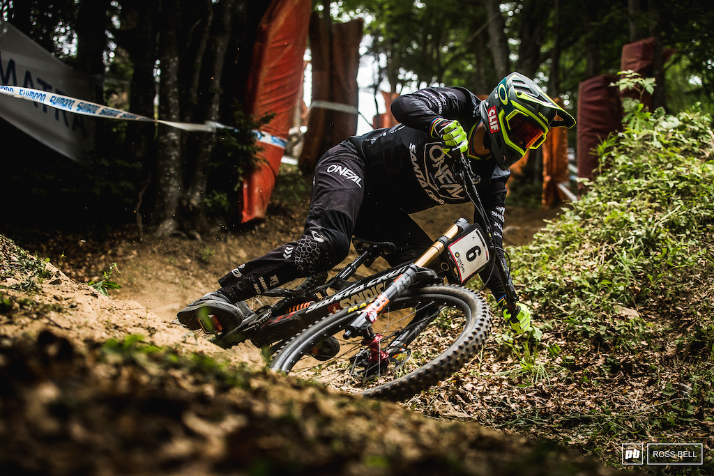 Greg Minnaar dives into the first steep section in the woods.
