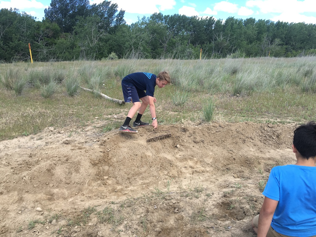 Gathering dirt for the berm