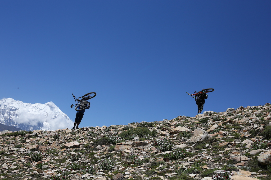 To get to the top, you have to do the hard yards. Carrying a bike above 4000m is no Joke!