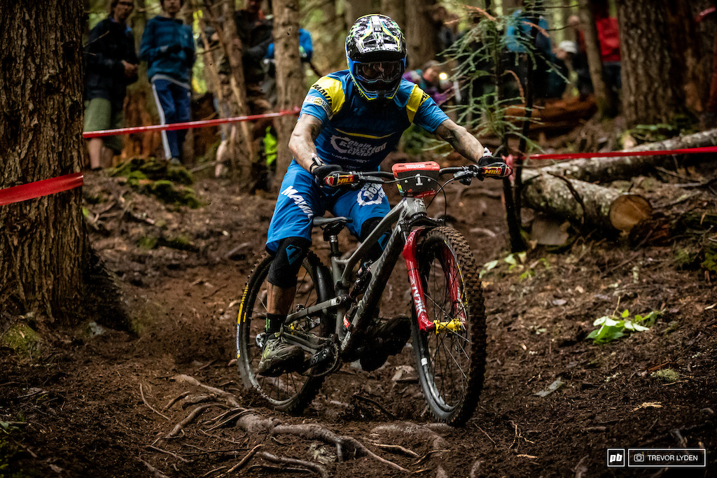 EWS leader Sam Hill sliding sideways.