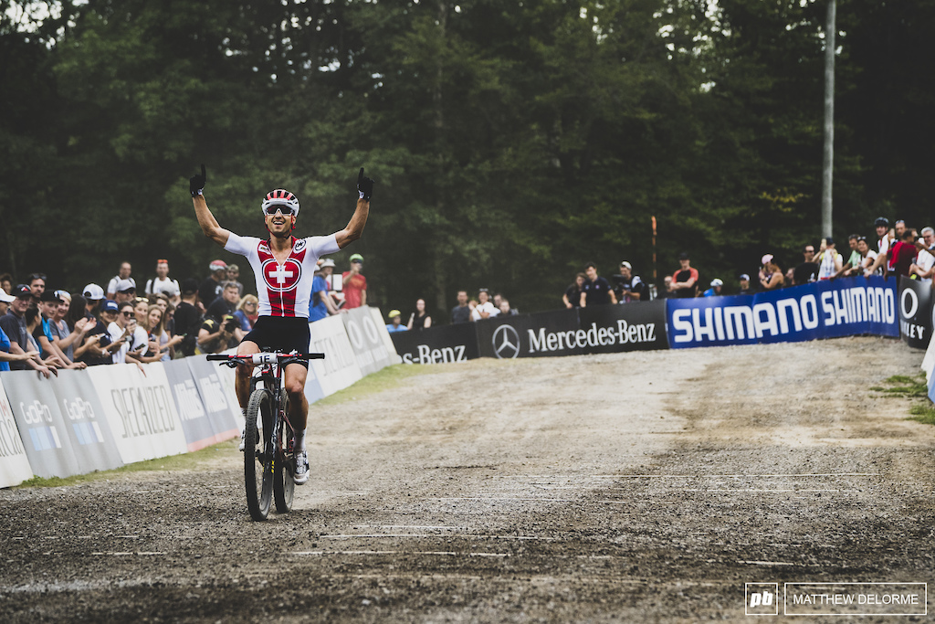 Nino Schurter brings the gold home for team Swiss.