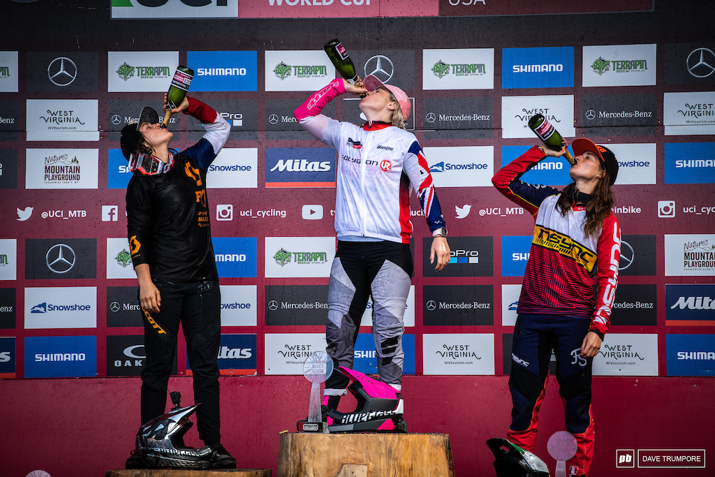 Tracey Hannah, Marine Cabirou and Vero Widmann drink to being the top three women in the World Cup overall standings
