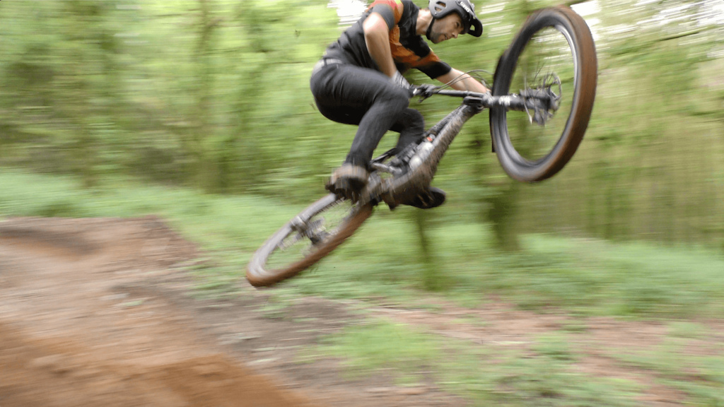 Nikki Whiles riding for Juice Lubes Home to Roost at his local secret trails.