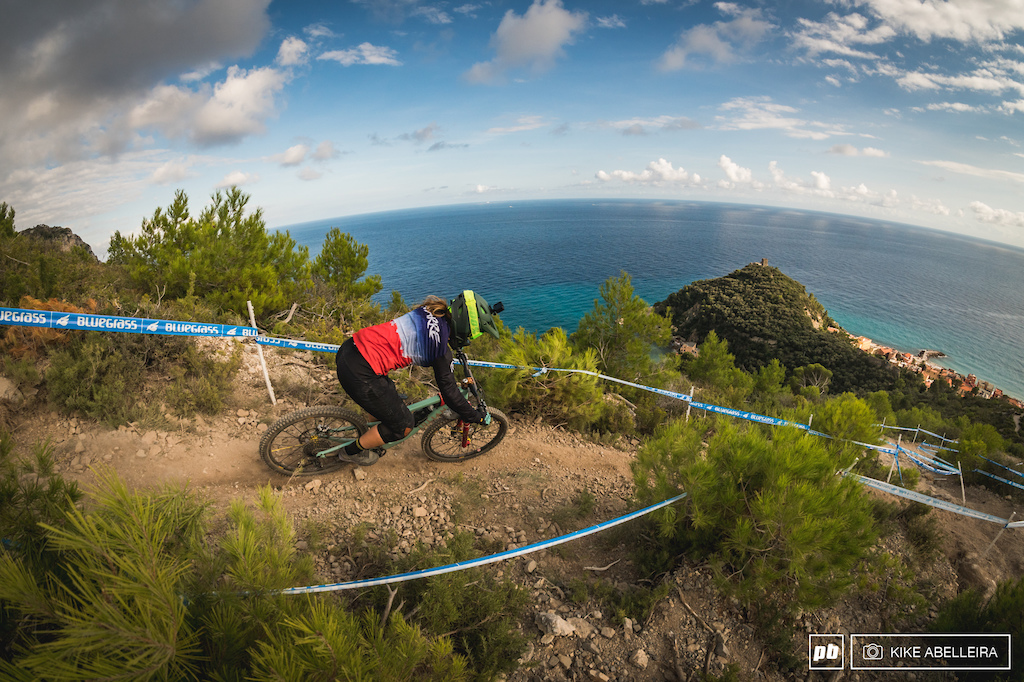 TON Finale ligure 2019 Second woman for team France Morgane Charre making her way down to Varigotti.
