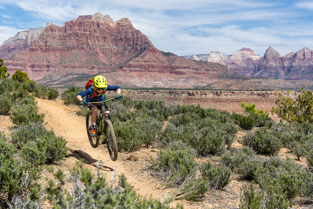 It's hard to keep your eyes on the trail at Wire Mesa but it's a good idea to resist the urge to gawk at the views when there's so much fun to be had hucking every small jump you can find. My 10 year old son, Jackson, spends as much in the air as possible on every ride.