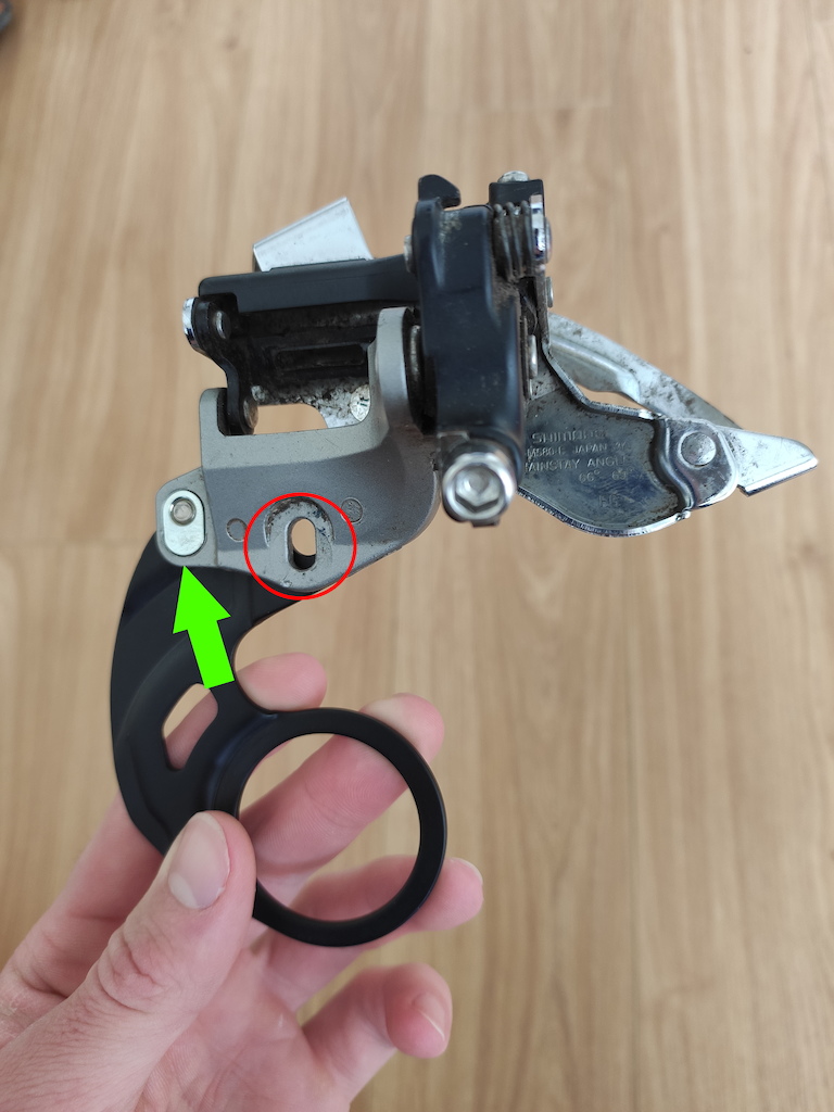Shimano Deore LX E-Type derailleur (FD-M580-E). Missing a small metal cap kind of piece that the bolt screws into to connect the spacer part to the derailleur. Does anyone know what this is called or where/if I would be able to find one?