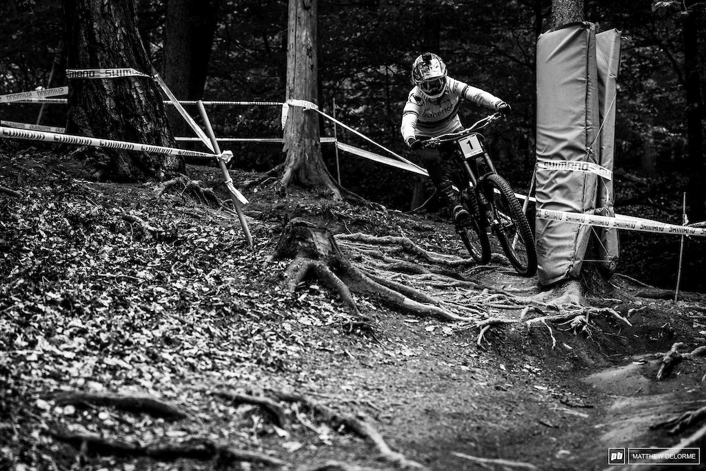 Rachel Atherton skimming over the roots.