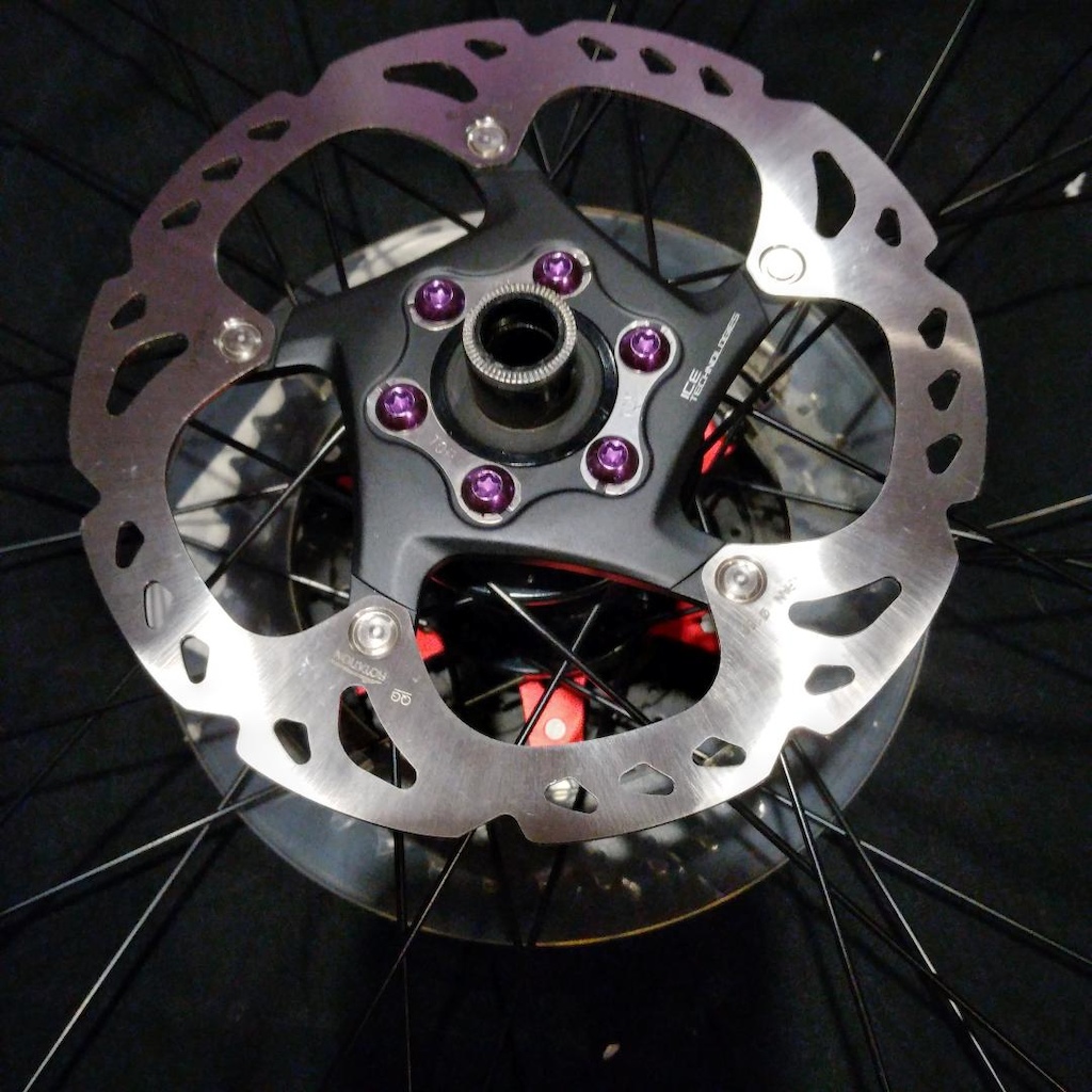 Shimano ICE Tech Rotor with the purple "Bling" rotor attachment bolts. Rear shown here
