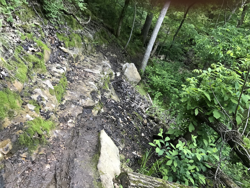 Run in to rock drop. Upper slick rock of doom or slide over hill. This trail is legit tricky.