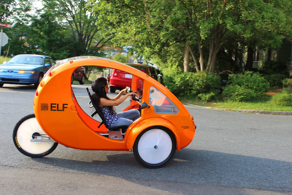 Organic Transit 2 seat Solar E-Trike represents a cross between a car and a bike