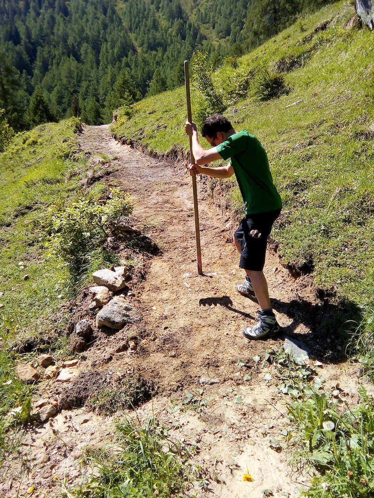 Helping create a new section of trail near the village of Campo Blenio in Ticino, Switzerland