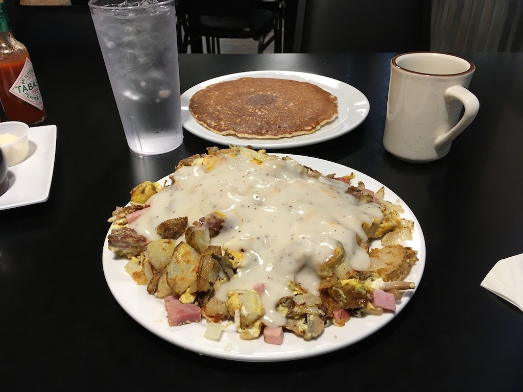 Breakfast skillet at All American Diner.  No-frill food with high lbs/$ ratio.  Perfect pre-ride meal after getting awaken too early by rain drops while camping in the boonies.