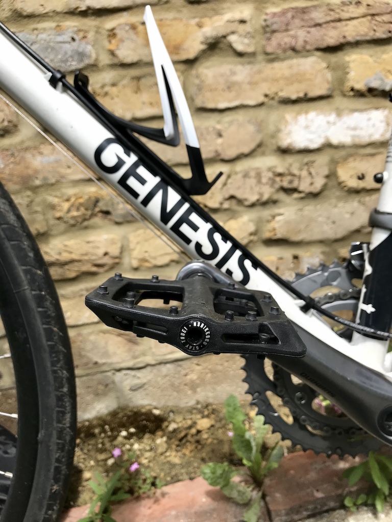 Fit and contact points upgrades.

NS Bistro pedals as a lightweight grippy option. They take curb-hits with grace. Also Specialised Rib Cage for water bottles.