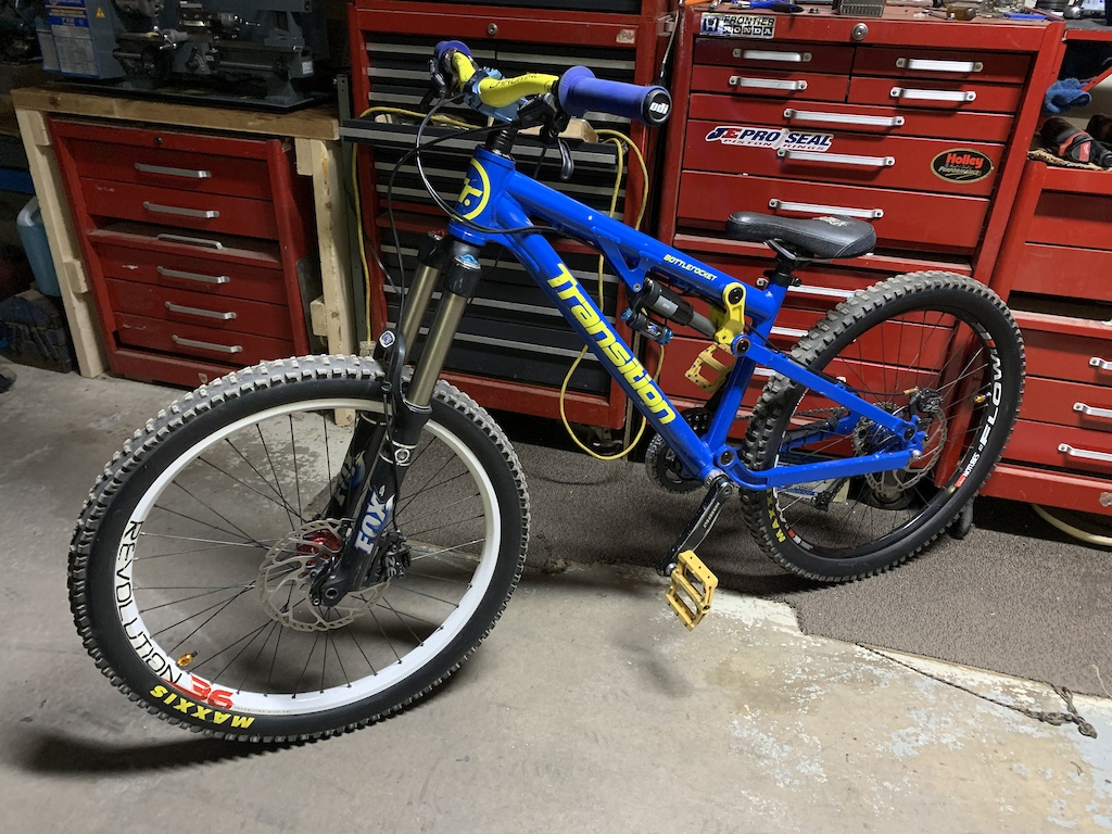 transition bottlerocket circa 2010 I think.  Weight in this photo is 38.5lbs but I've changed the tires (maxxis 1240g to schwalbe/specialized 820g) and its down to 36.3lbs now.  Got some panaracer comets coming (535g) to get even more weight off the wheels