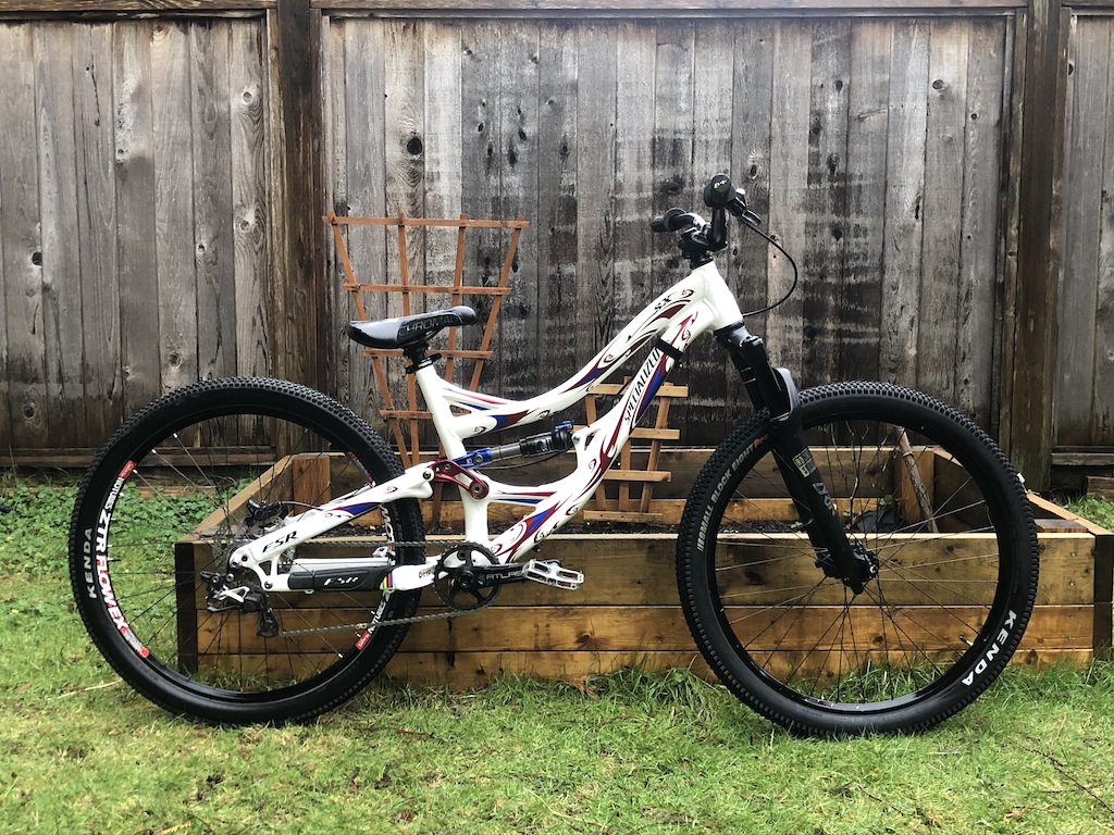 09’ Specialized SX - 2018 Lyrik 27.5 with custom 100mm air shaft. A2C height the same as a 26” Fox 36 100mm

Bike also dropped almost 2 lbs from the old fox 36. Sitting at 29.9lbs on my scale!