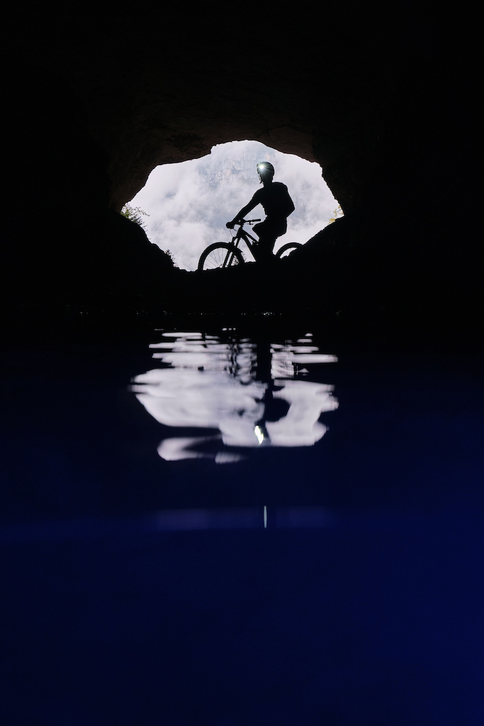 We went in Chartreuse with Lapierre rider Fred Horny to shoot some stuff for Mavic with video maker Luc Gregoire. I knew I wanted to shoot in the water so I brought the right stuff. We ended up in this cave with a small lake in it and at the end of the photo session as I was about to get out of the freezing water, I saw this silhouette idea and took a few shots of Fred from the blue water (we used a water resistant blue led light here).