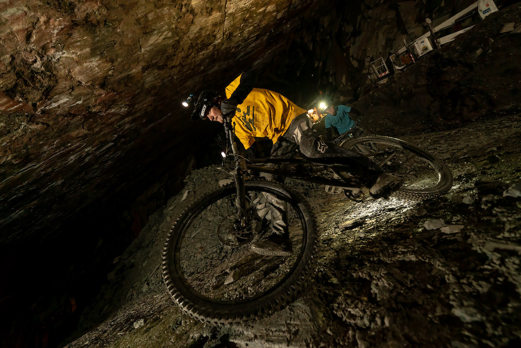 Finding unridden lines deep in a working slate mine in The Lake District.