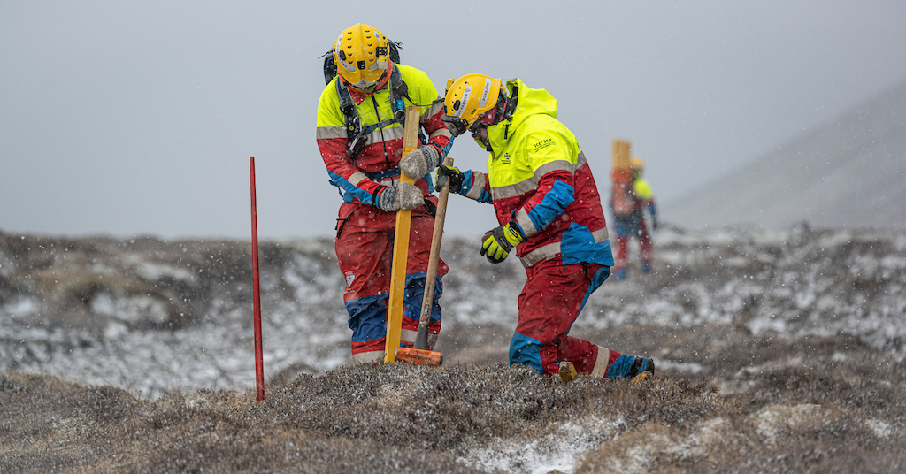 Local search and recue squad "Björgunarsveitin Þorbjörn" hard at work marking the trail up to the Icelandic volcanic eruptions in Geldingadalir 2021.