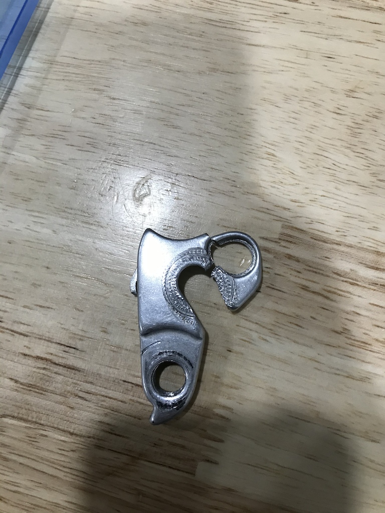 Broken derailleur hanger , impossible to find match , any help would be appreciated. It’s off a Morpheus skyla .