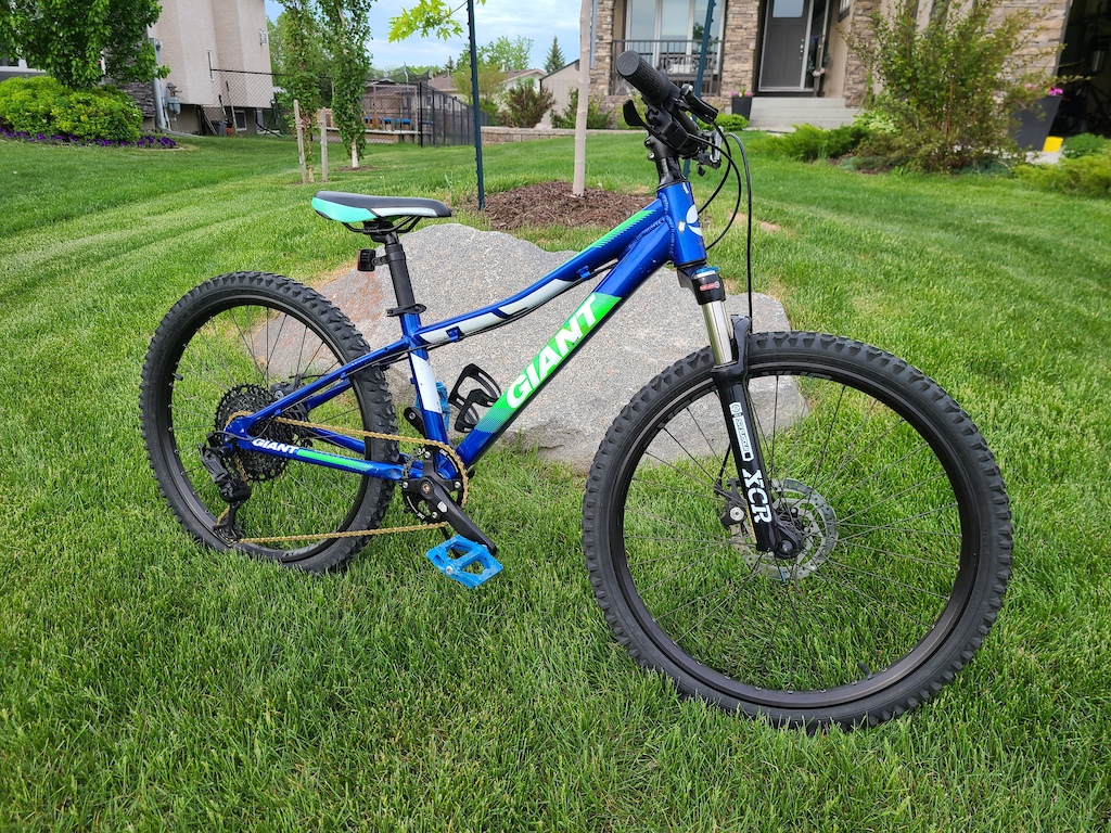 2018 Giant XTC Jr. 
Microshift Advent X 10spd, XT hubs, Dartmoor Raider rims, HUP 145mm crank, One-Up oval chainring. Kmc chain. SR Suntour XCR LO 24 air fork. Specialized enduro bar and 40mm stem. 160mm front rotor.