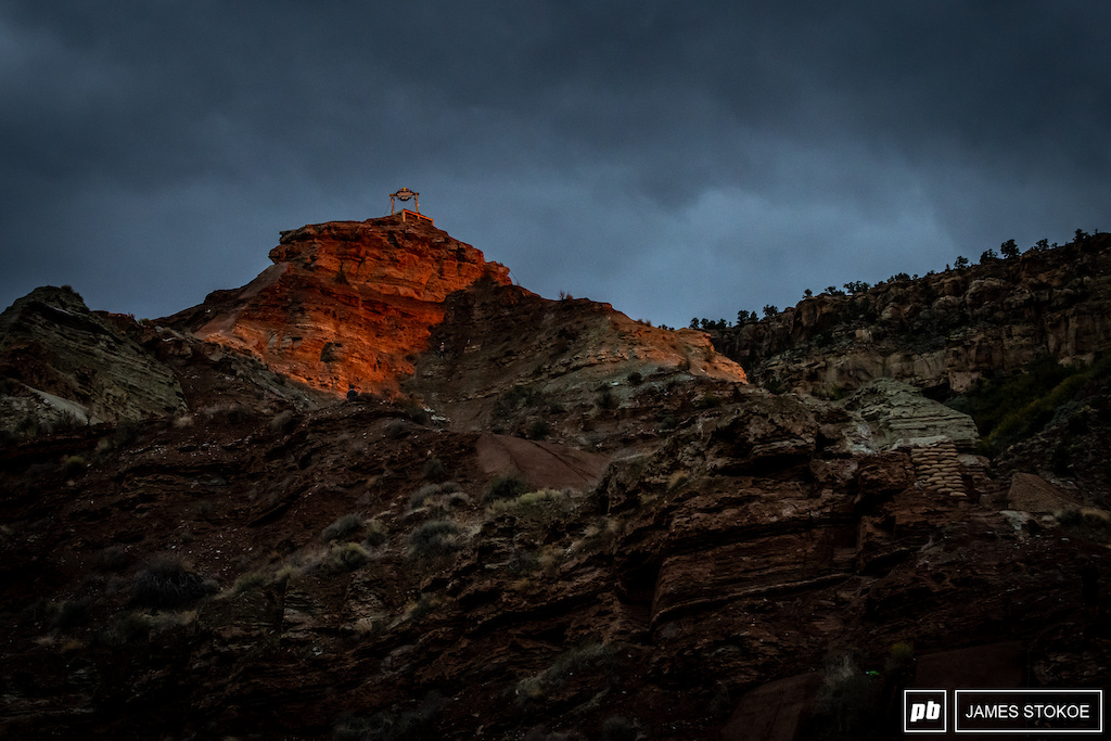 The sun managed to peek through the storm clouds for just a second at sunset to light up the start gate with a glow that makes the red rock pop like no other place.