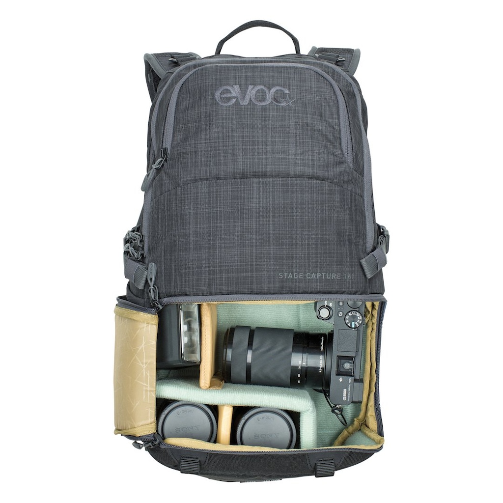 EVOC Stage Capture 16 Liter camera gear backpack showing externally accessible padded compartments for carrying photography equipment