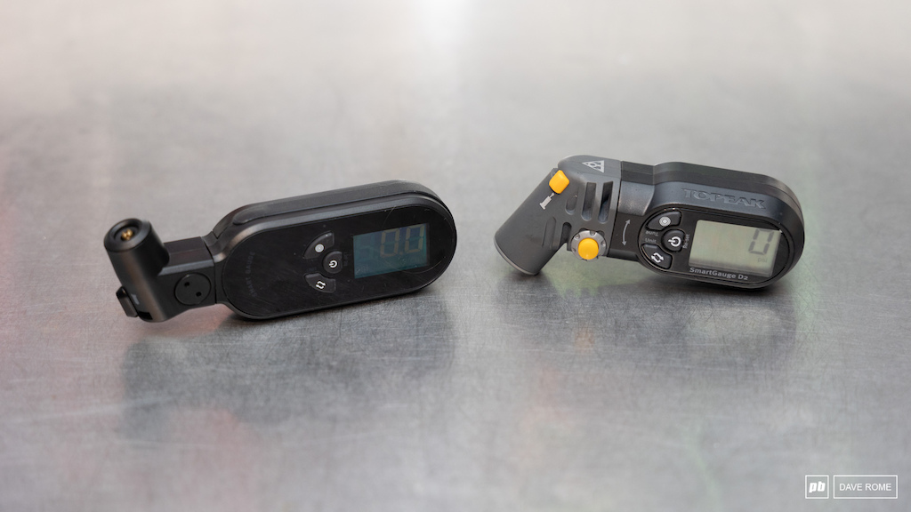Topeak s original SmartGauge D2 digital pressure gauge right is a popular pick for those seeking consistent and accurate pressure measurement without breaking the bank. The new SmartGauge D2X left is a higher-end version that offers a sleeker design and a 360 rotating head.