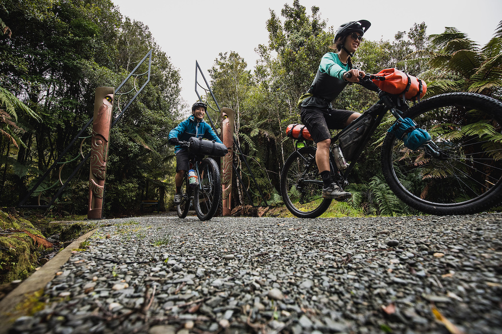 Khulan Tumen and Viet Tieu ride the Paparoa Track