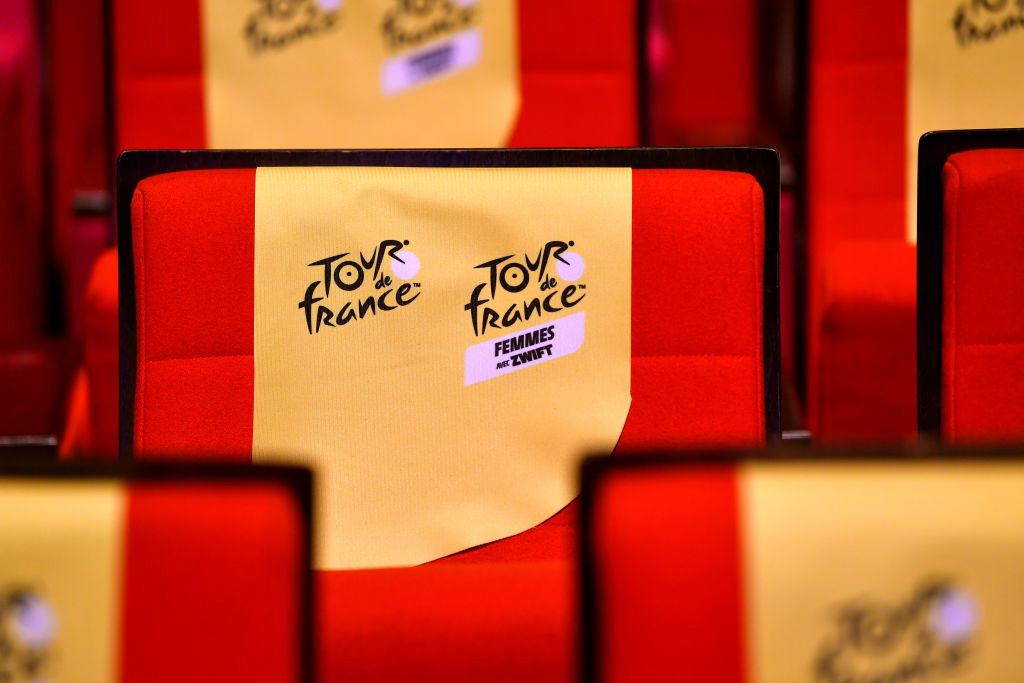 PARIS FRANCE - OCTOBER 14 Detailed view of the chairs at the event where you can read the women s and men s Tour de France logo during the 109th Tour de France 2022 And 1st Tour de France Femmes 2022 - Route Presentation TDF2022 LeTour on October 14 2021 in Paris France. Photo by Luc Claessen Getty Images 