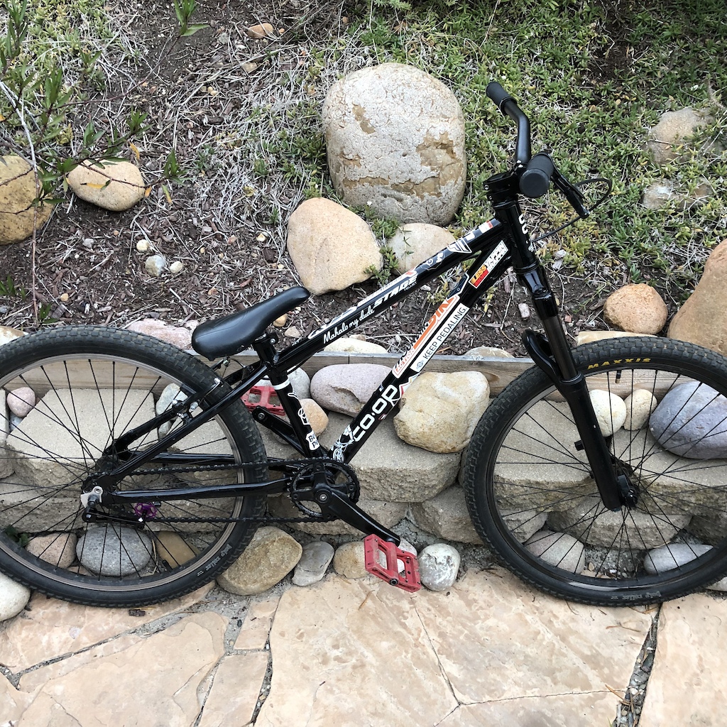 My custom kids bike-> dirt jumper conversion. Has been in varying stages of completeness, last "stage" had a worse fork and no tensioner.
The stage before that had the stock components except for the drivetrain.