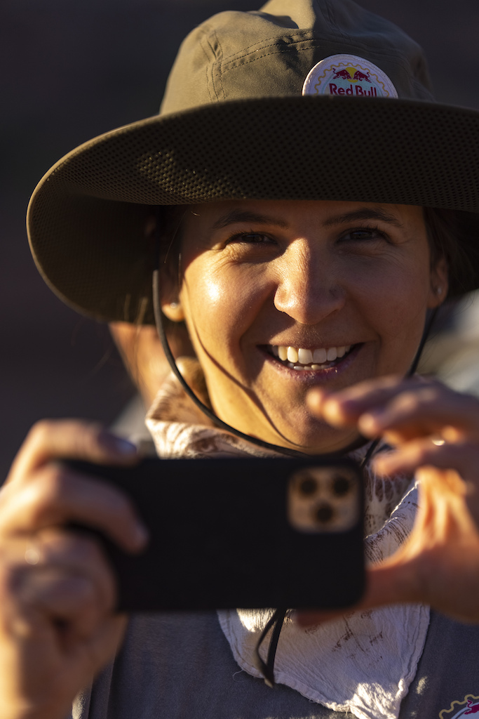 Katie Holden takes a video on her phone at Red Bull Formation in Virgin Utah USA on 31 May 2021.