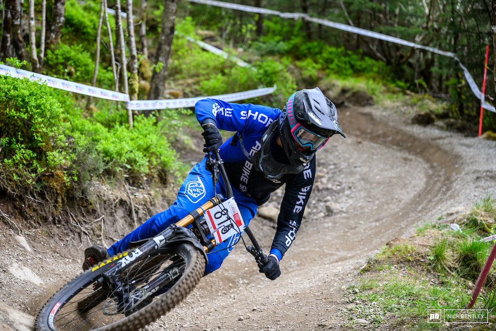 Ramsay Dalgliesh carving his way through the berm section before the river gap