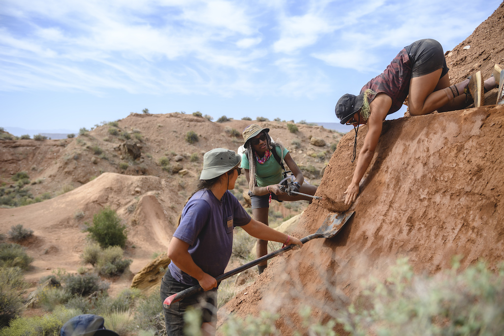 Martha Gill Juju Milay Robin Goomes work together to sculpt a take off at Red Bull Formation in Virgin Utah USA on 09 May 2022
