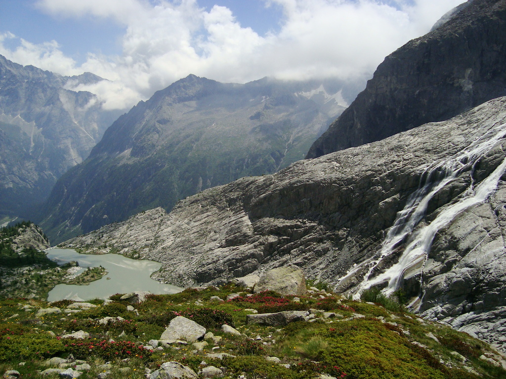 Waterfall after Mandrone Hutte, in background the Genova valley