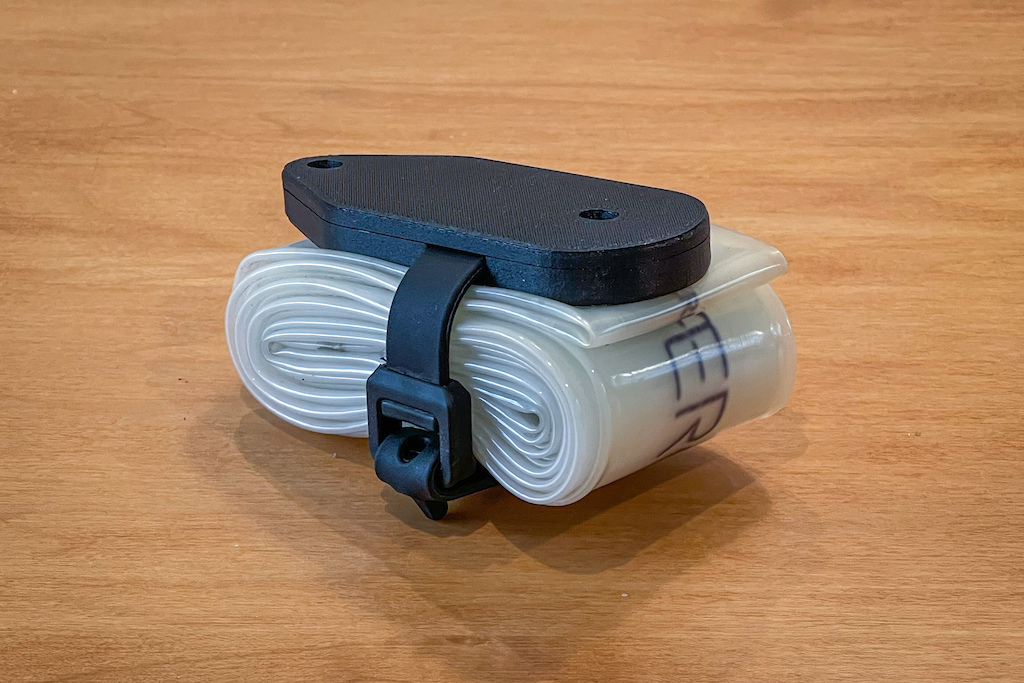 3d printed tube strap bracket with airtag holder