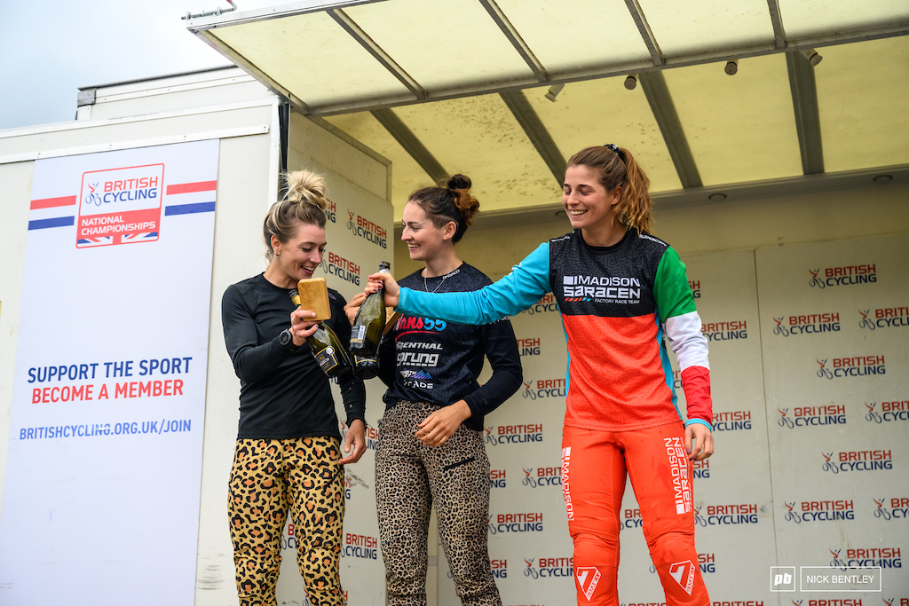The quiet after the storm, cheers all round on the Female Elite Podium