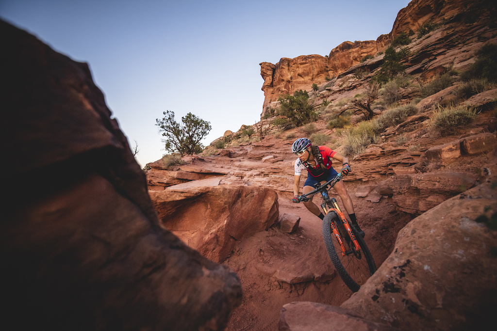 Hannah Otto weaves through sandstone on the classic Porcupine Rim trail section of The Whole Enchilada in Moab, UT
