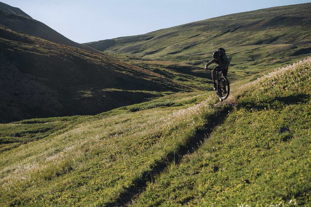 The Chilcotin Ranges trail network offers various single-track descents. The trip synced perfectly with the wildflower season adding to the beauty of the landscape.