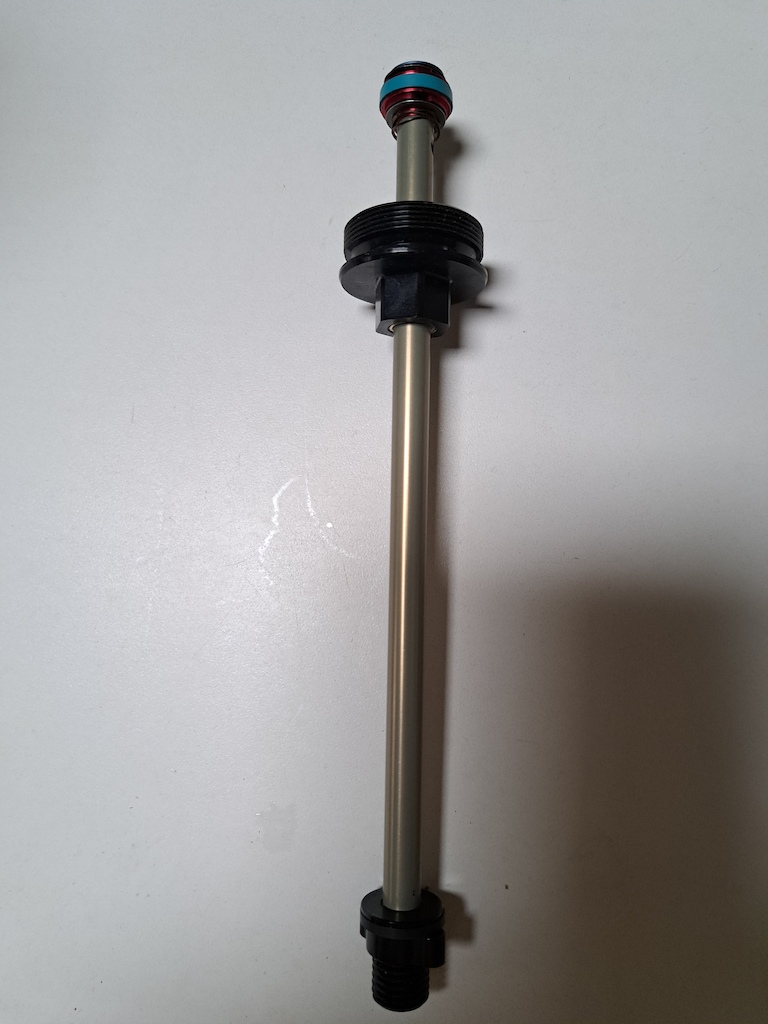 Minute R7 rebound shaft assembly