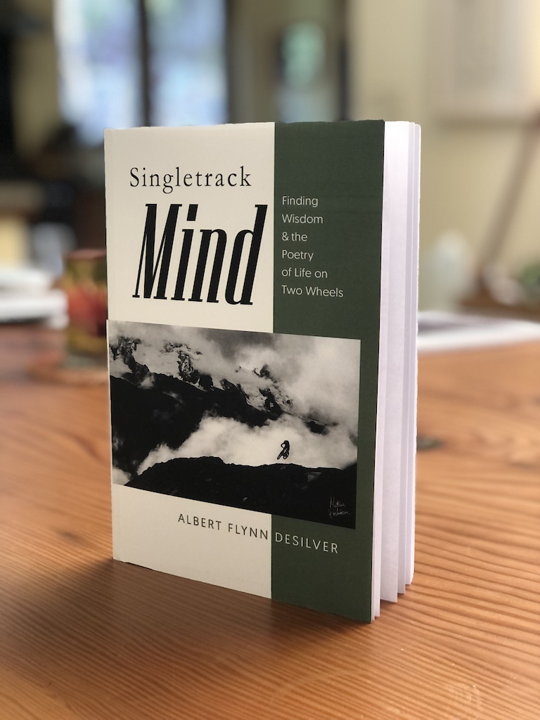 This is a copy of "Singletrack Mind: Finding Wisdom & the Poetry of Life on Two Wheels" a new collection of essays about the spirit of mountain biking in wild places. You can get a copy at https://www.lulu.com/shop/albert-flynn-desilver/singletrack-mind/paperback/product-zg5q6z.html?q=singletrack+&page=1&pageSize=4