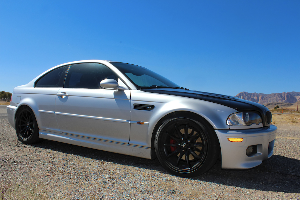 My e46/M3, The side view shows the Carbon Fibre GTR hood and the black-out fender vents. The Wheels are STR Racing. The car is lowered on Ohlins Track Spec Coil-Overs.