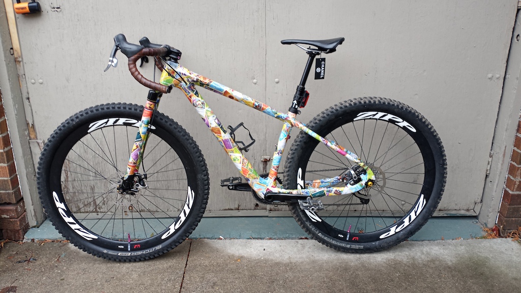 This is my...Poké-bike 
.
.
.
Let me know what you think. Would you ride this bike plastered with pokemon cards? 
.
If you're curious about the 6 day process I've loosely outlined it below  
.
But seriously tho this took 5 or 6 days and countless hours of labour to basically wrap my entire frame and fork in pokemon cards! 
.
The process started with soaking the cards in water to allow the layers of paper to separate. Separating the cards was totally brutal. This was an experimental process (ive never seen it done) and took alot of trial and error to get it right.
.
When I eventually figured that all that out, I "paper machéd" the frame with a water bucket of mush at my side(this took 6-8hours). It involved alot of flipping and positioning cards and bike frame and I was stuck in terrible positions alot of the time
.
Once dry, I then went back over the entire frame with clear UV proof epoxy. 2 coats of that with drying time in between and after all that wait time, here is the fruits of my labour hahahhaha
.
.
This bike gets daily ridden back and forth to work every day, rain or shine. And most recently threw a harsh canadian winter so I can post photos of how it's holding up
