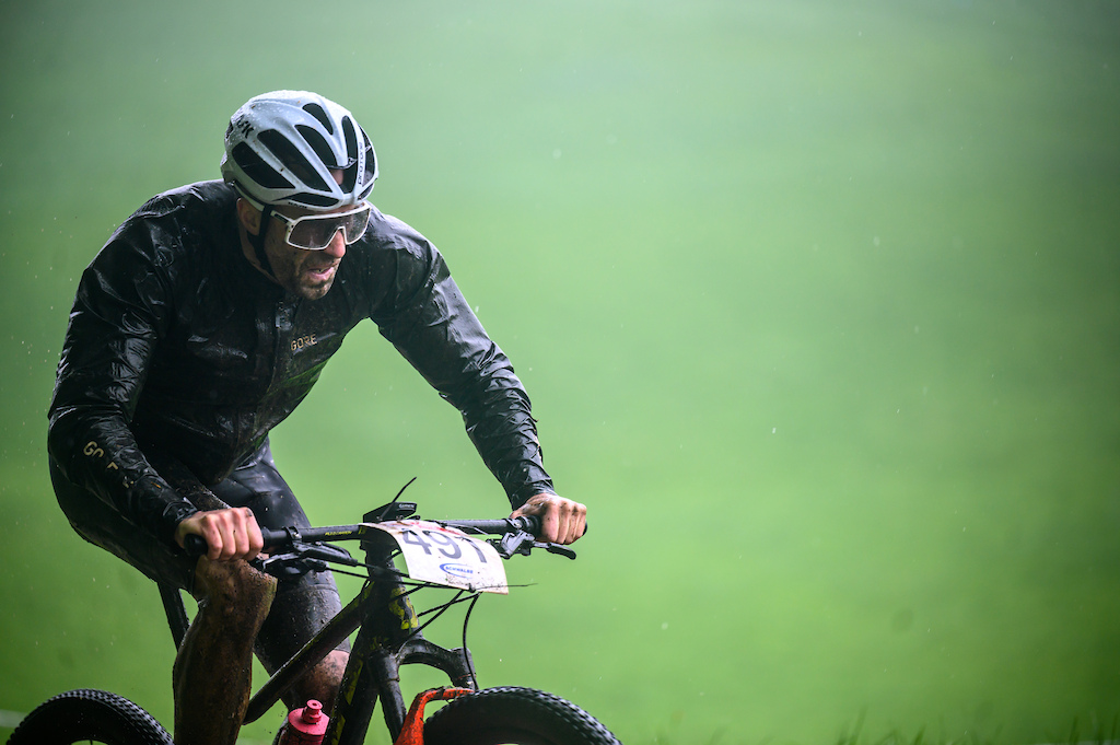 Rain coats were a necessity in the open race