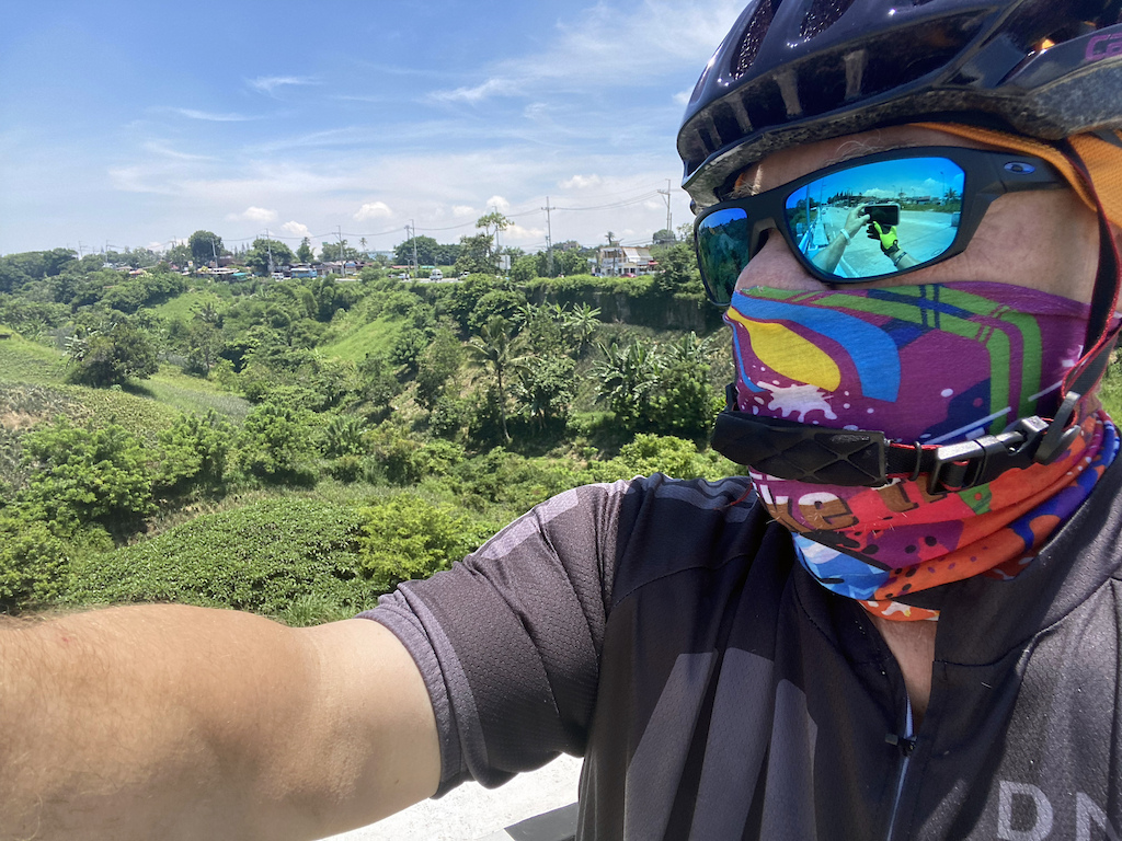 I am looking up the road to the clouds. To the main road into and out of Tagaytay. It is a good road to start my rides, as there is usually less traffic on this road.

I wear a mask mostly because of the grit in the air from the still-steaming nearby Volcano,