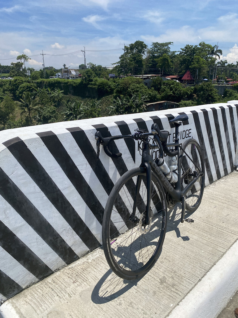 On the bridge, that is the "Short-Cut" up to the main road on the ridge of TAAL Lake.

She might be from 2018, but I still love my R3/Disk. She is a great dance partner.