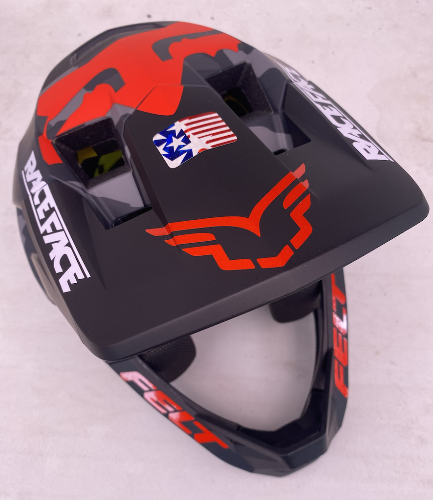 I am calling this my FELT "Team Issue" Fox Proframe Helmet. It came with the red FOX logo, so I added the FELT Logo to the visor. plus the RACE FACE and the American Symbol on the visor